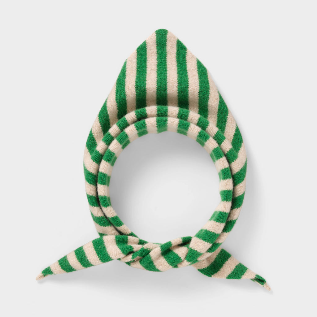 Green and cream striped knit scarf, folded into a triangular shape.