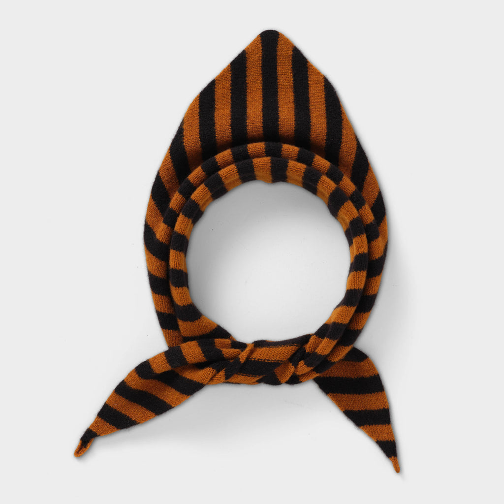 Brown and black striped knitted scarf, folded into a triangular shape.