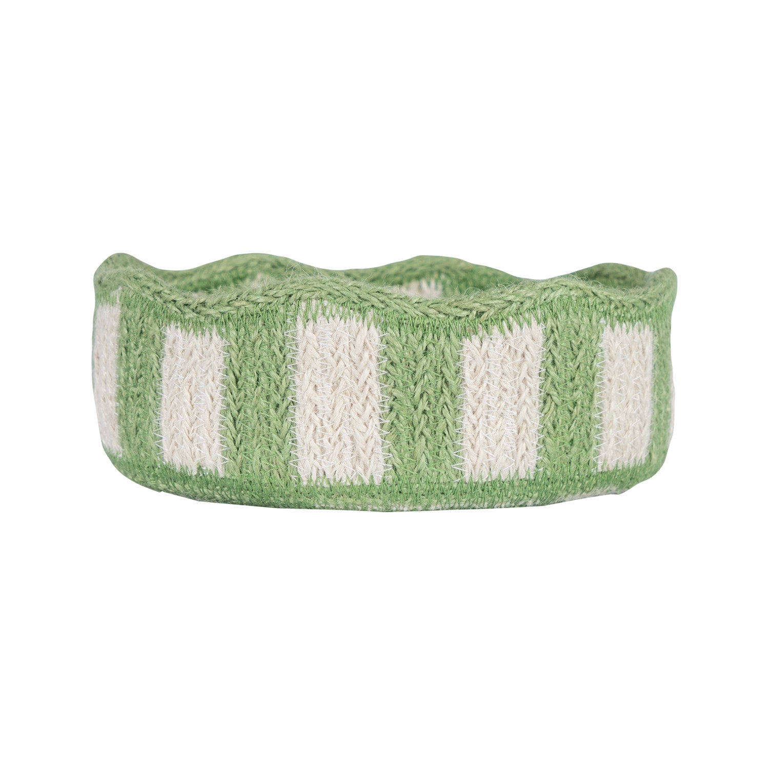 Green and off-white striped knitted basket with a wavy top edge.