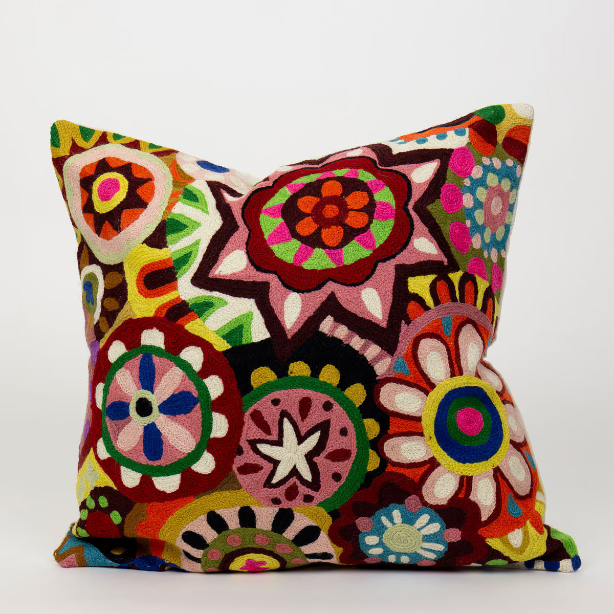 Brightly coloured and patterend cushion 