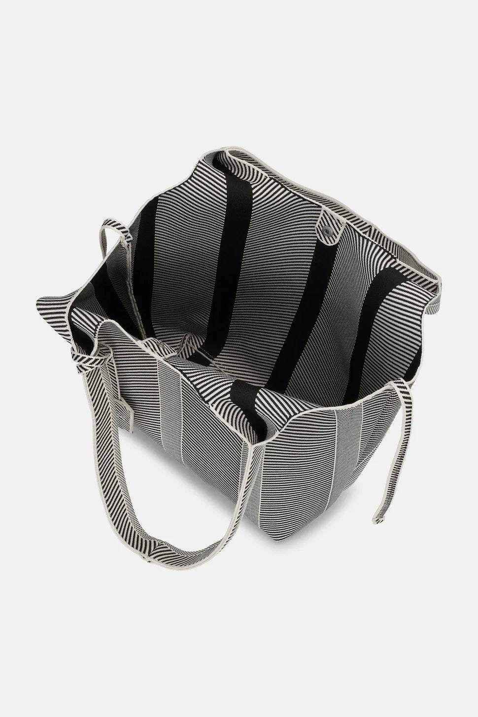 Black and white striped bag on a light gray background