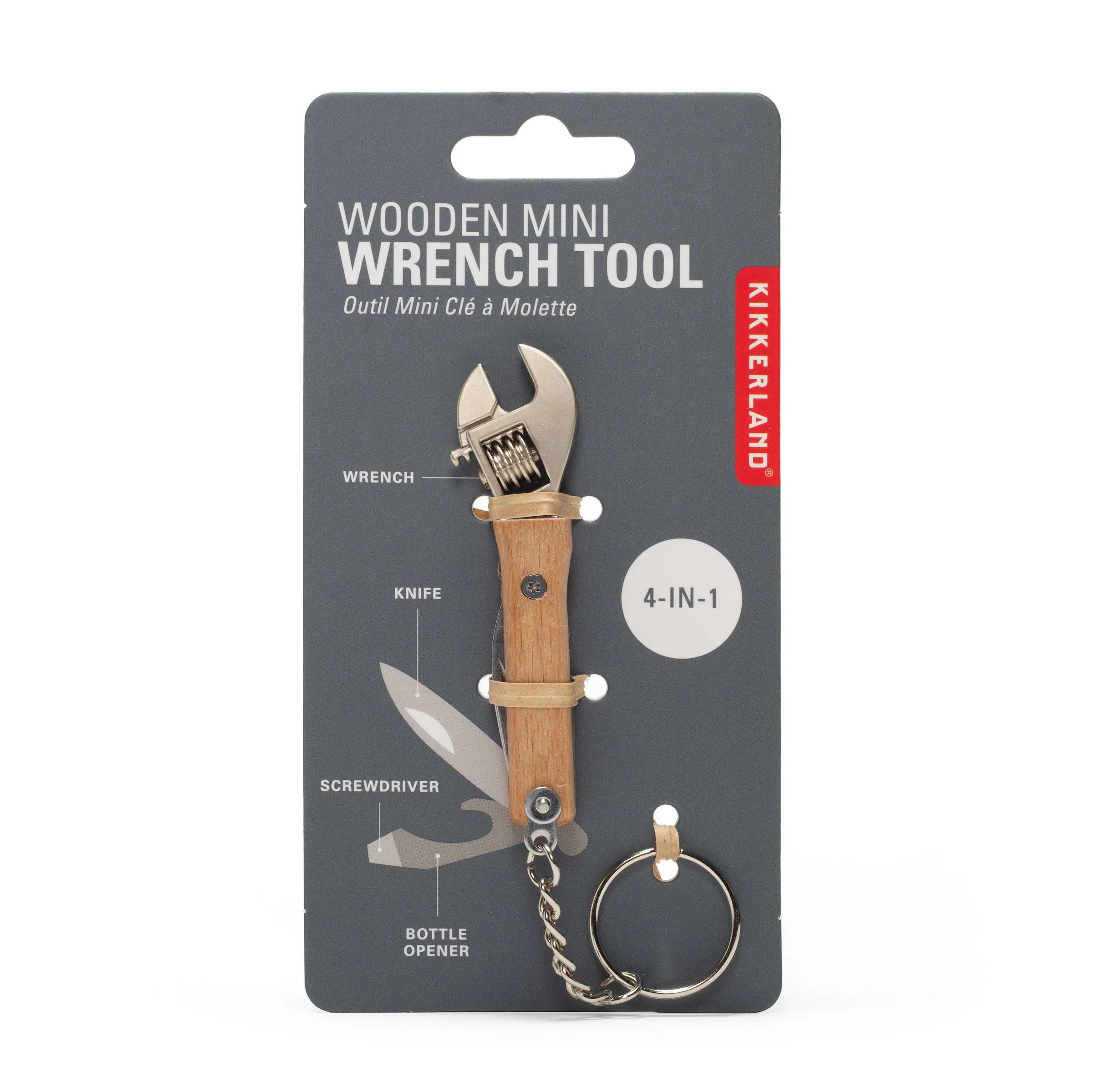 A wooden mini wrench tool keychain in its retail packaging. The product features a light brown wooden handle with a silver adjustable wrench head, a metal knife blade, and a screwdriver bit, attached to a silver keyring.