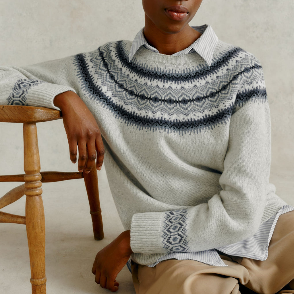 woman sat on floor leaning on a chair wearing a Harley of Scotland Ladies Yoke Jumper - Nuage