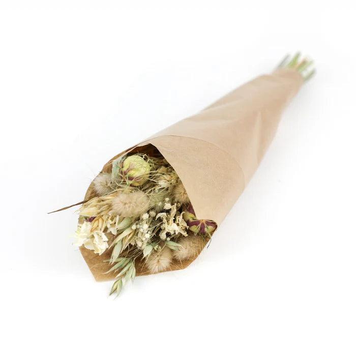Dried flower bouquet wrapped in kraft paper.  Includes wheat, dried grasses, and small blossoms in cream and beige tones.