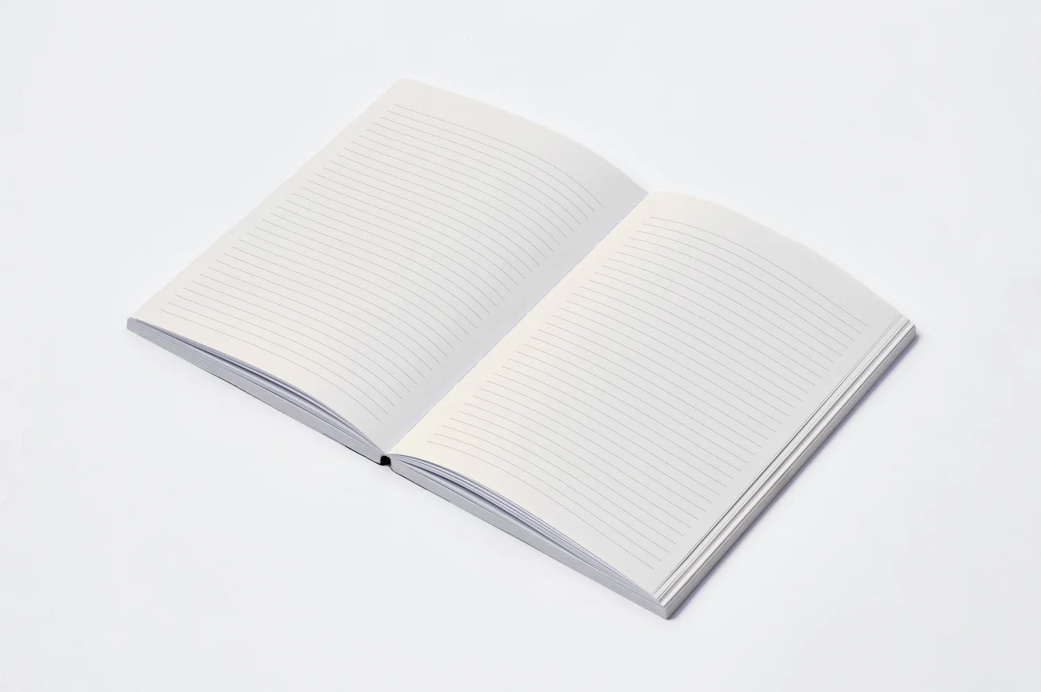 Open notebook with white pages on a light gray background