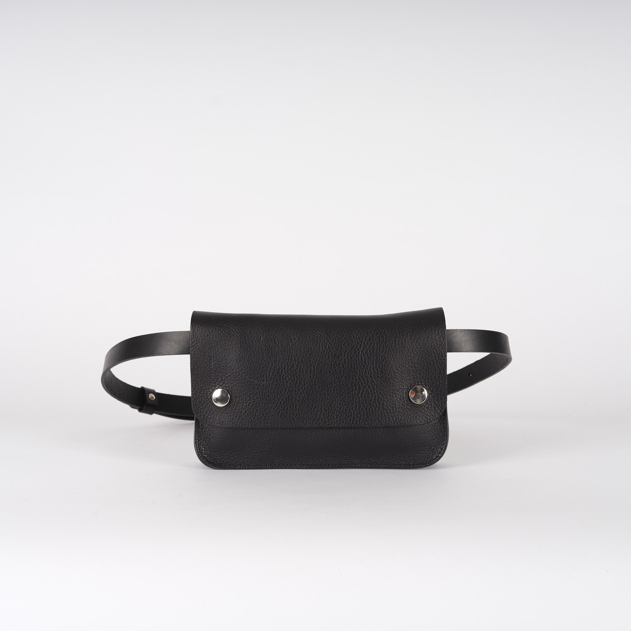 Black leather belt bag with silver-toned snap closures.