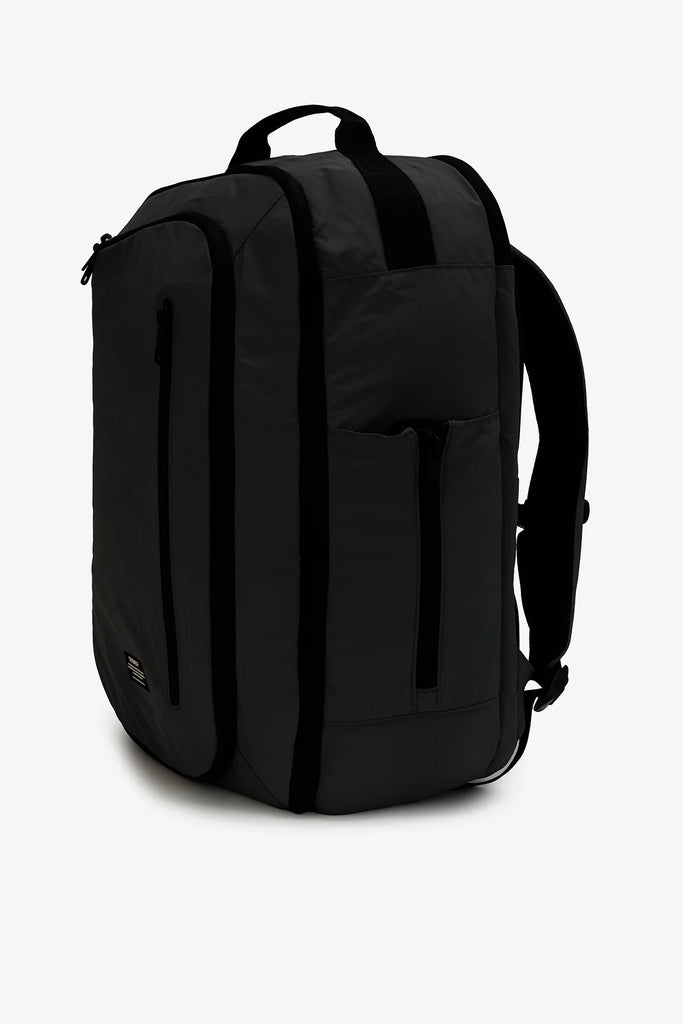 Black Ecoalf backpack with a sleek design and multiple zippered pockets. It has black straps and accents.