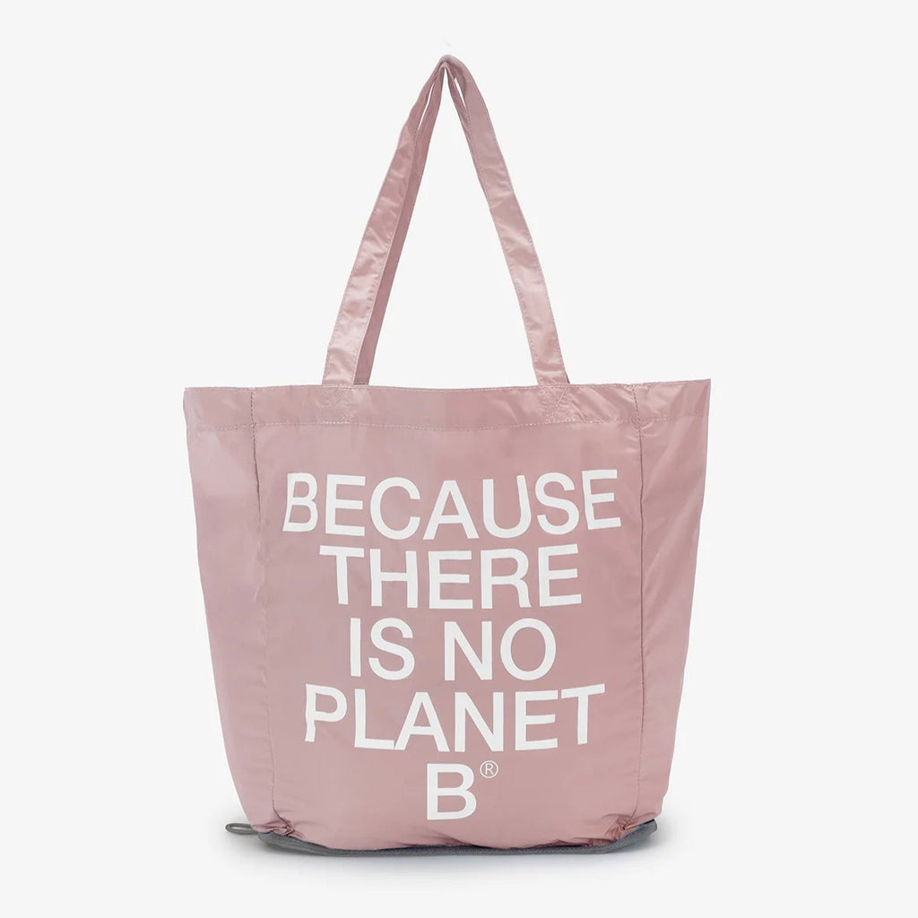 Ecoalf tote bag in soft pink with white text: "BECAUSE THERE IS NO PLANET B." Simple and eco-friendly design.