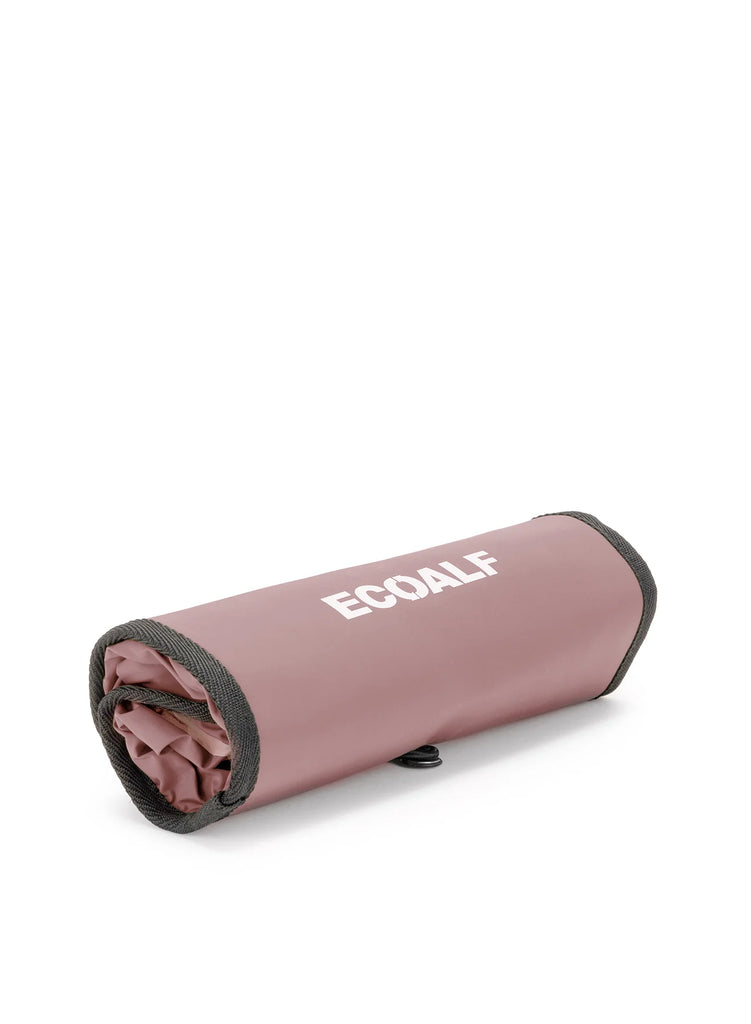 Rolled pink Ecoalf blanket with a gray trim, featuring the brand name in white.