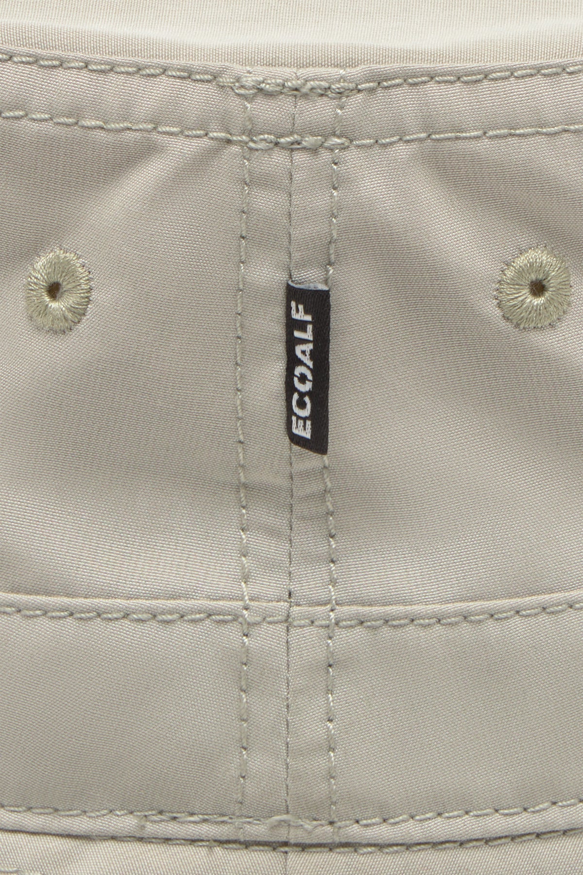 Close-up of a beige fabric with a 'ECOalf' label.