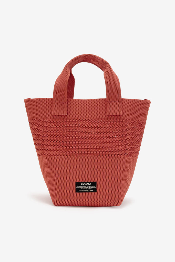 Ecoalf bag in coral with textured design and sturdy handles, featuring a black brand label on the front.