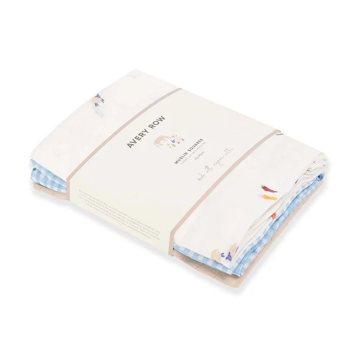 Folded baby blanket with colorful patterns on a white background