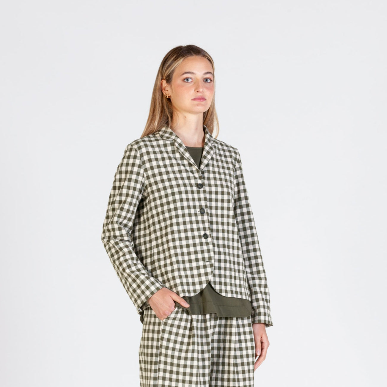 Olive green and cream gingham linen blazer with notched collar and button closure.