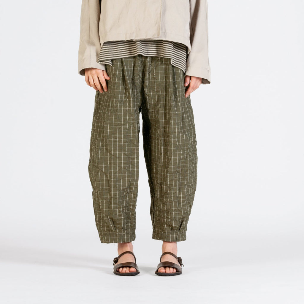 Alga green bubble trousers with fine white line grid pattern. 