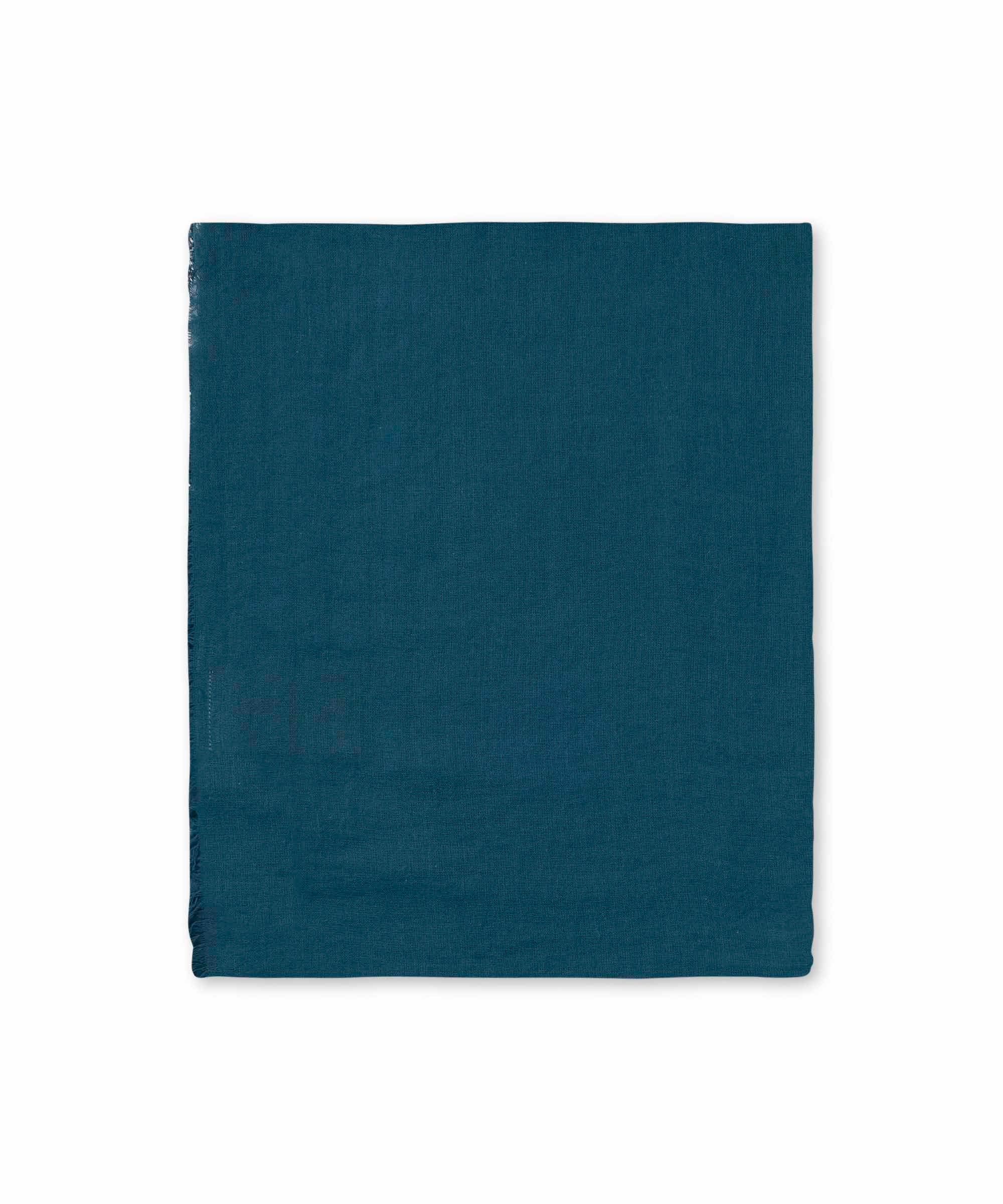 Teal square fabric swatch with slightly frayed edges.