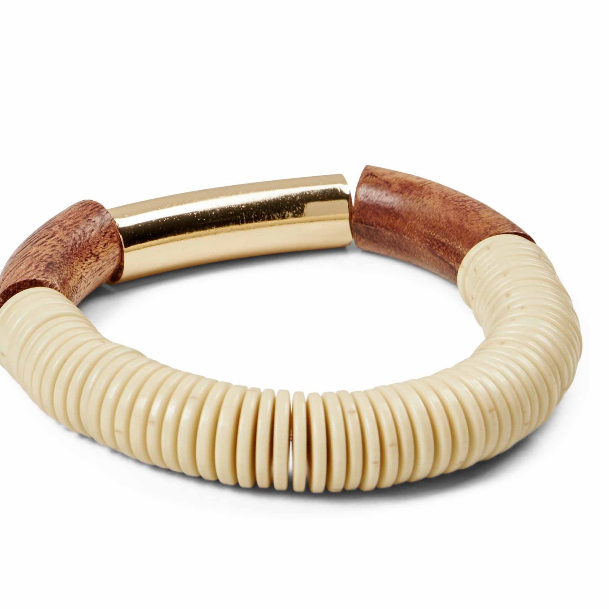 Off-white disc-shaped beads and dark brown wooden accents form a bracelet with a gold-toned metal bar clasp.