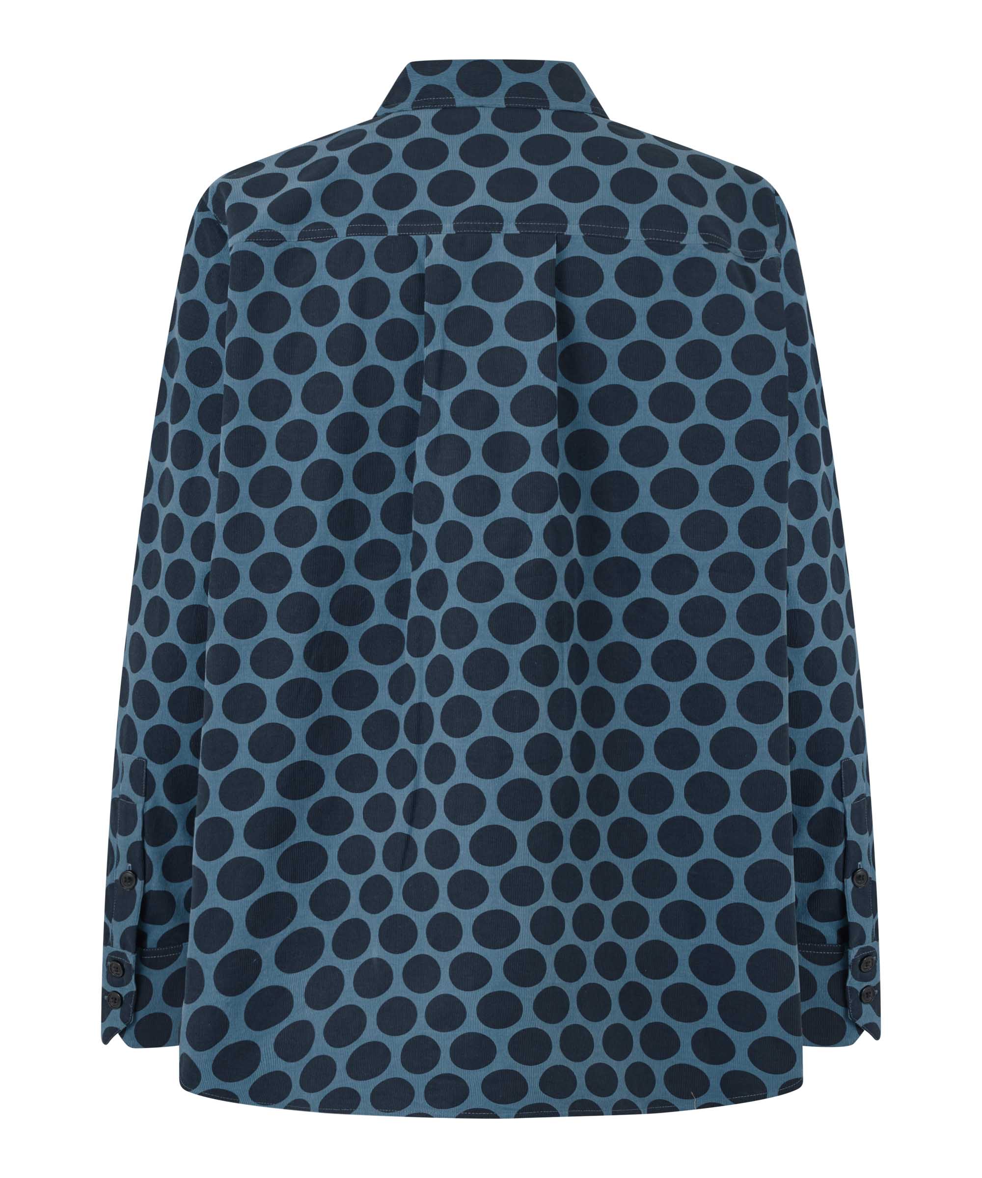 Blue shirt with black polka dot pattern on a white background