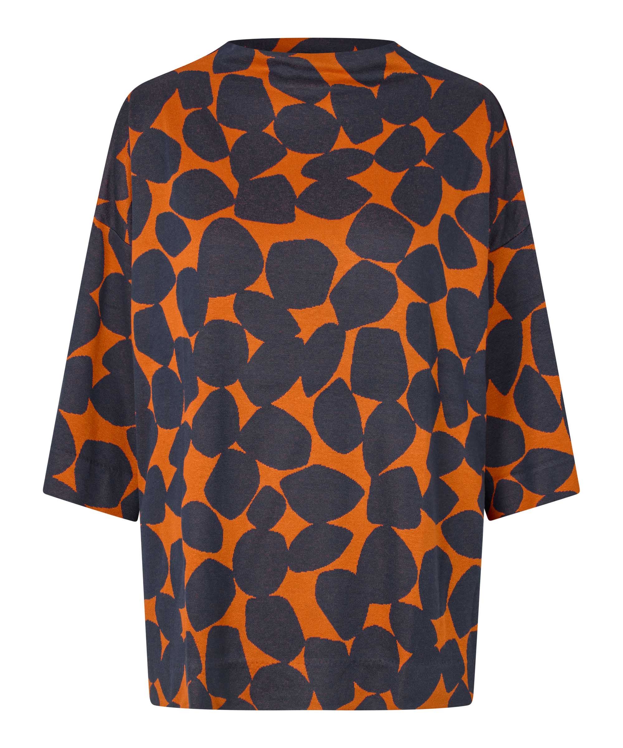 Orange and black patterned shirt on a white background
