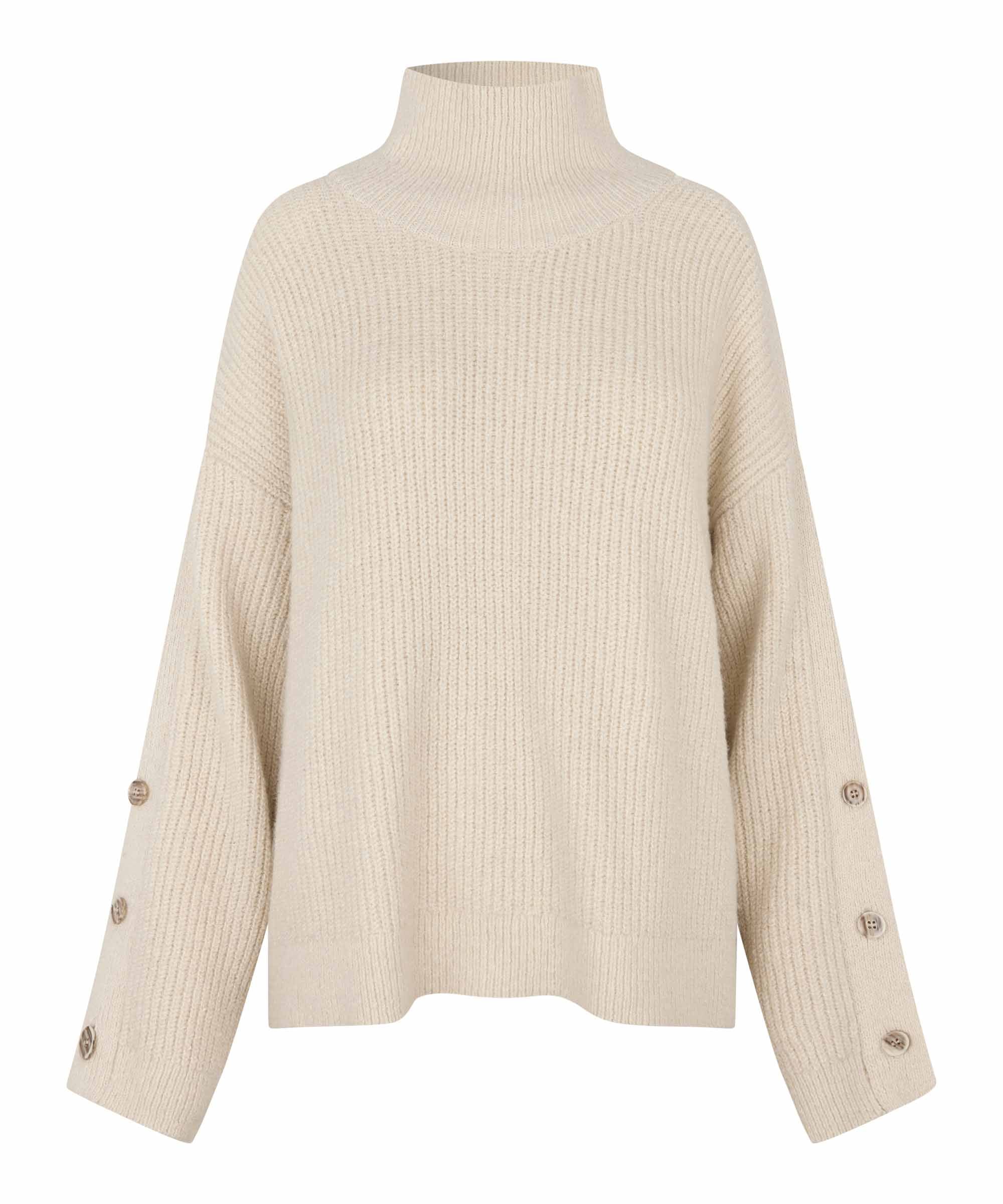 An oversized cream-colored ribbed knit turtleneck sweater with decorative buttons on the sleeves, shown against a plain white background.