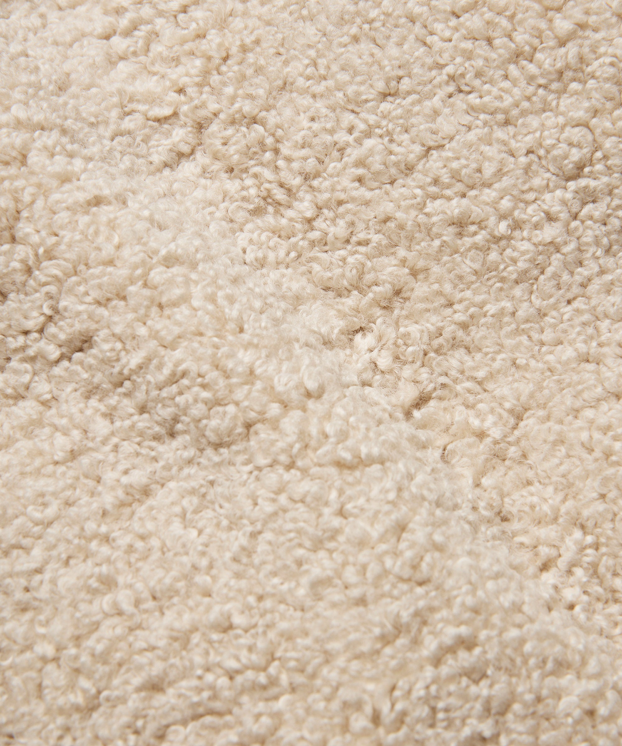 Close-up of beige carpet texture