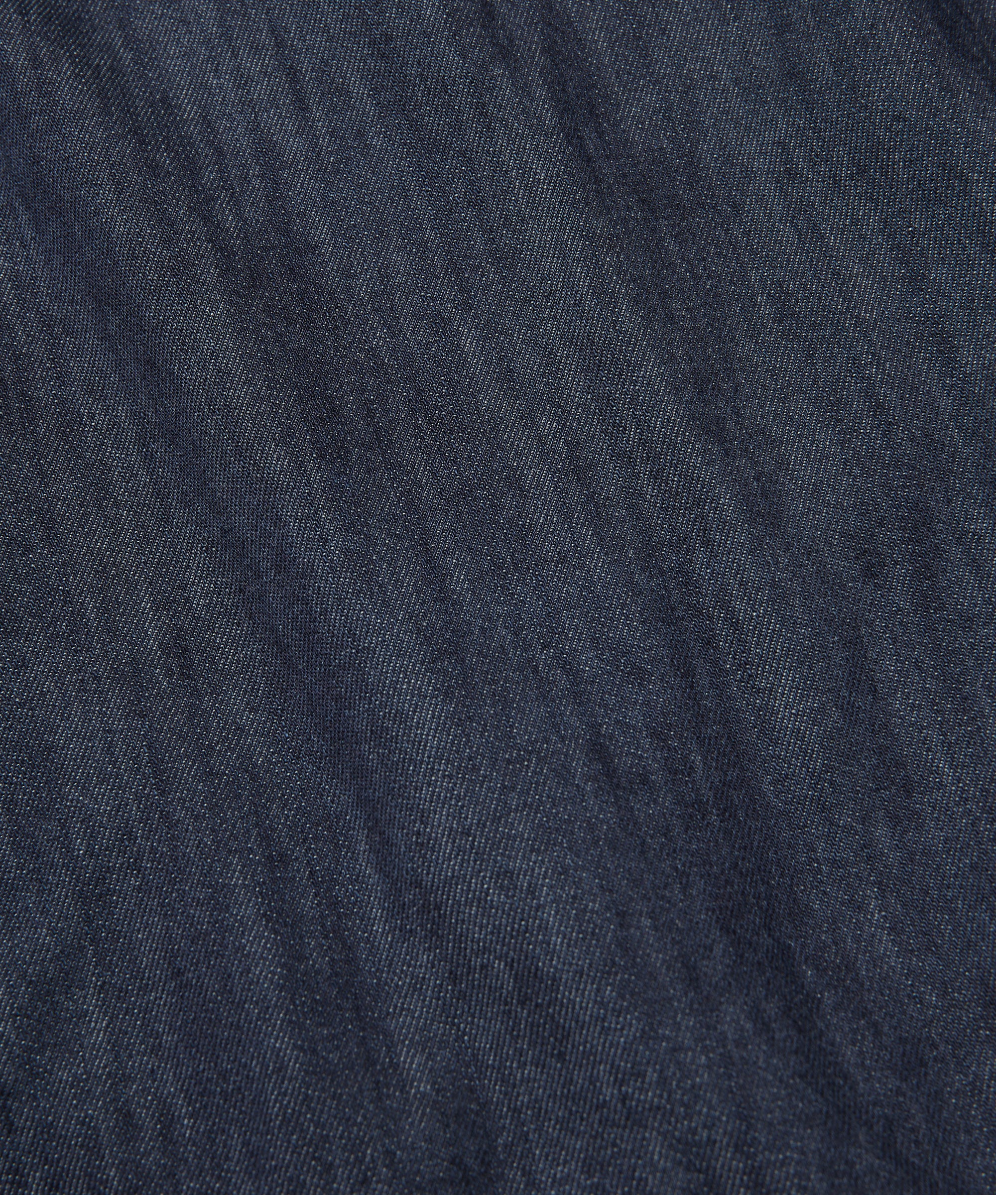Close-up of dark blue fabric texture