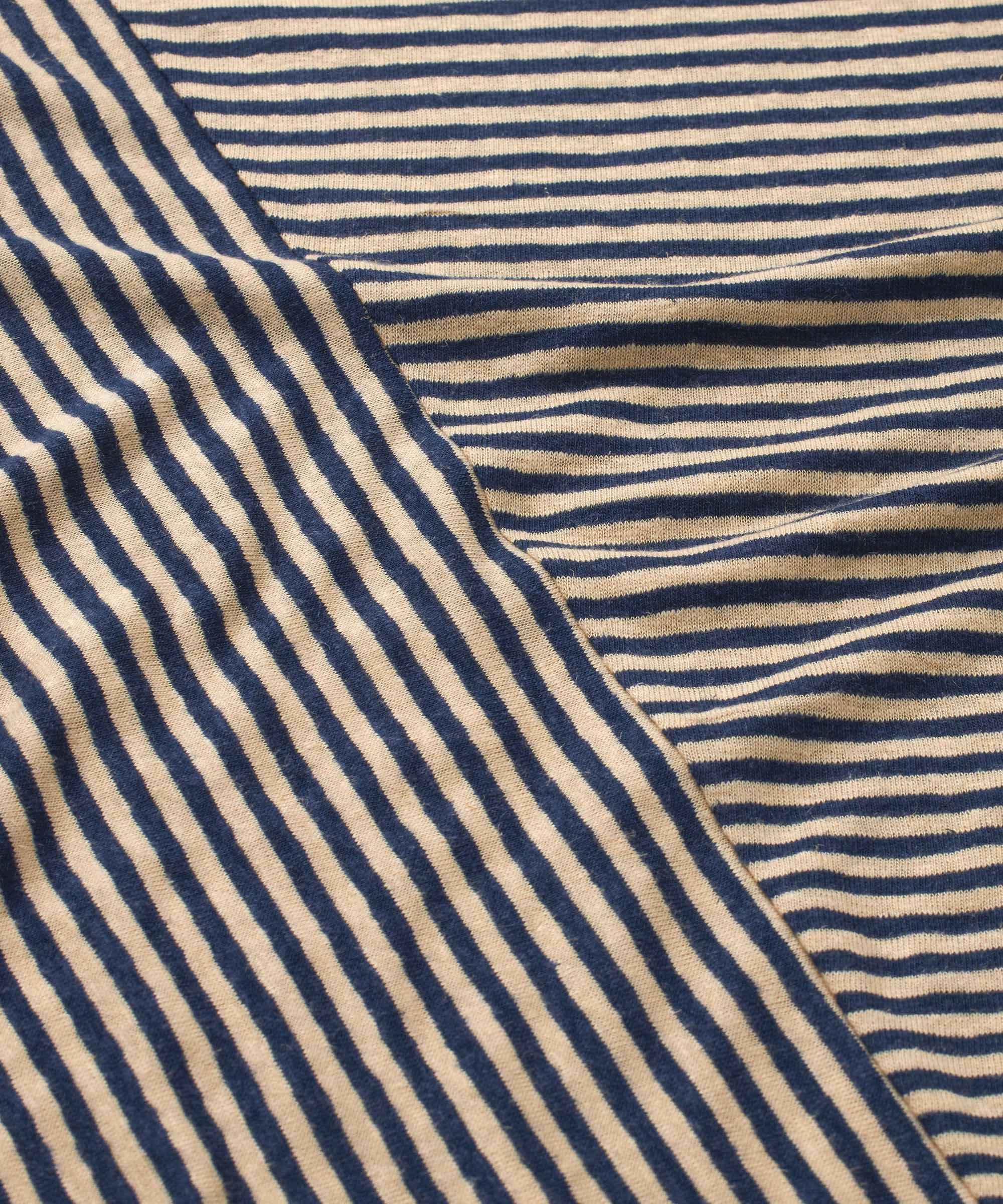 Close-up of a blue and beige striped fabric texture