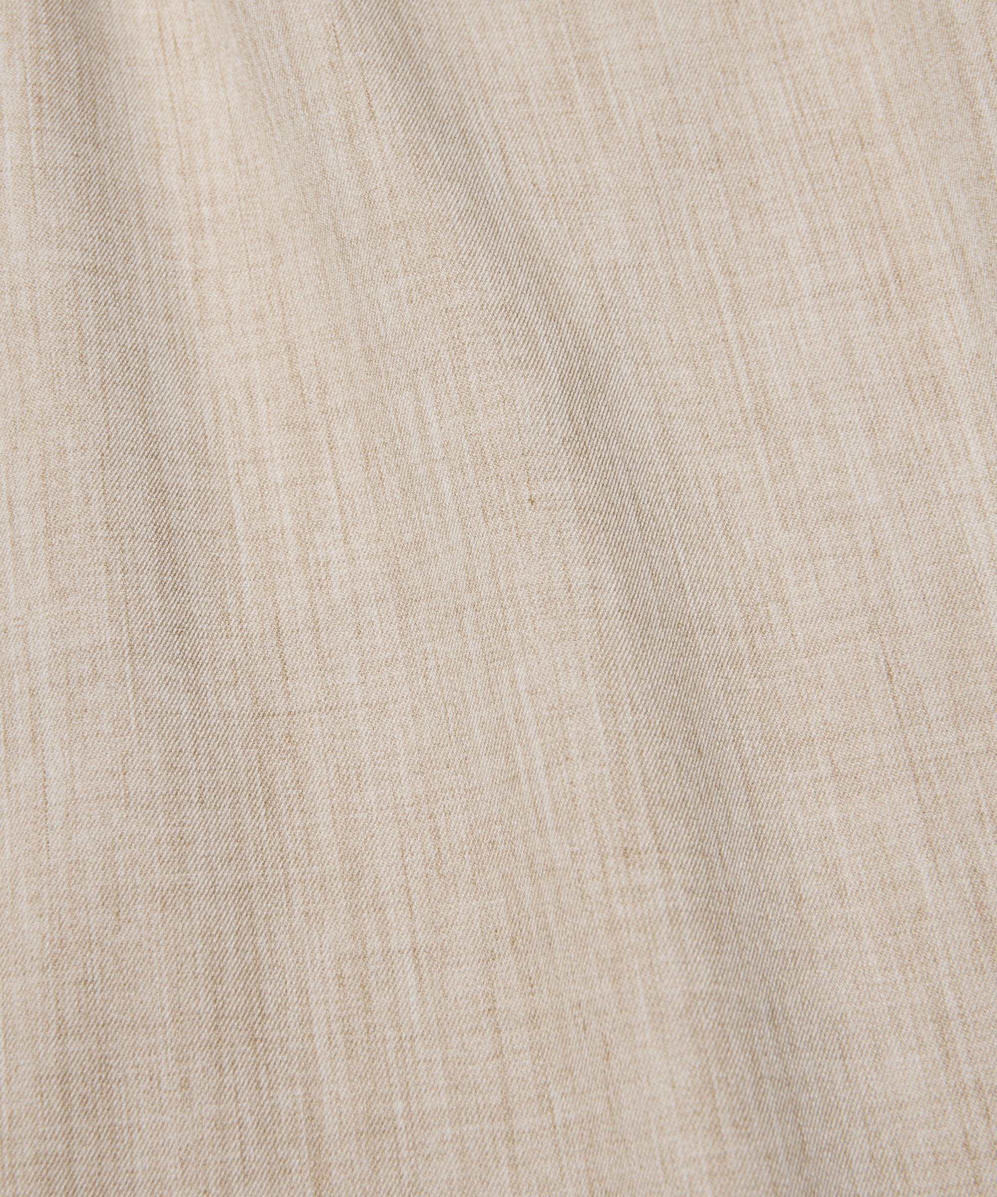 Close-up of beige fabric texture