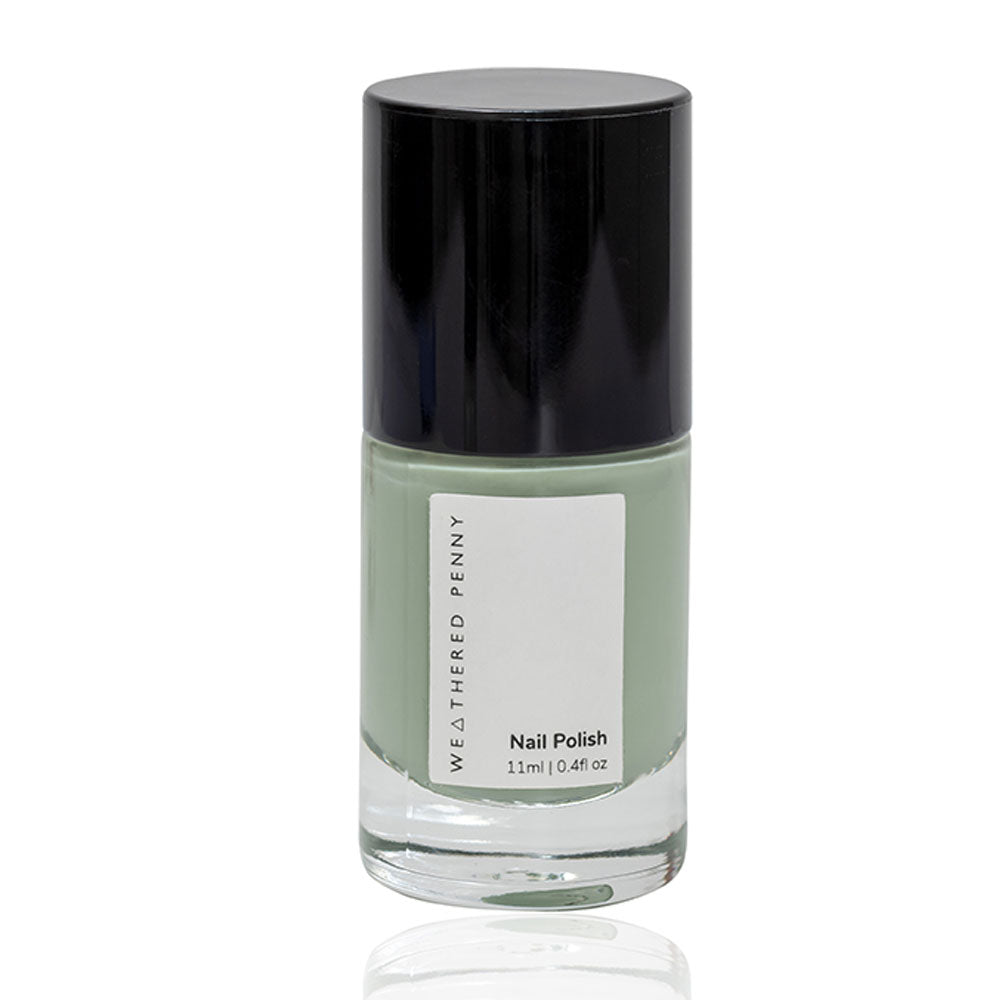 Weathered Penny nail polish bottle, 11ml, sage green color, black cap.