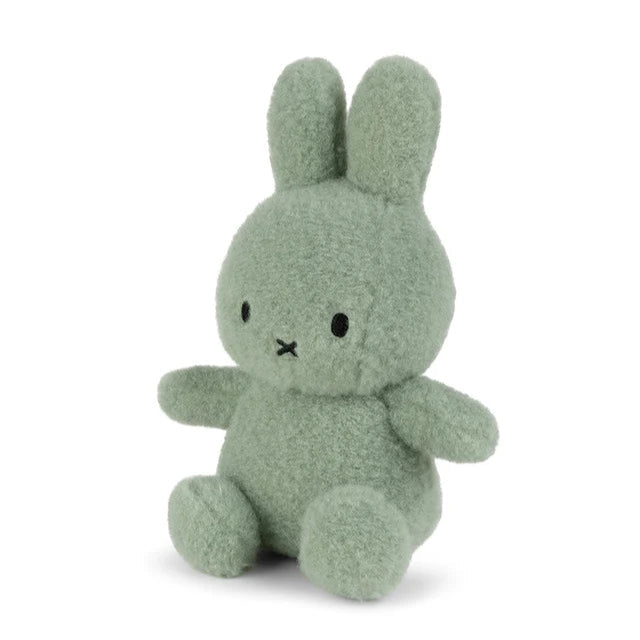 Sage green plush Miffy bunny rabbit sitting, simple embroidered facial features.