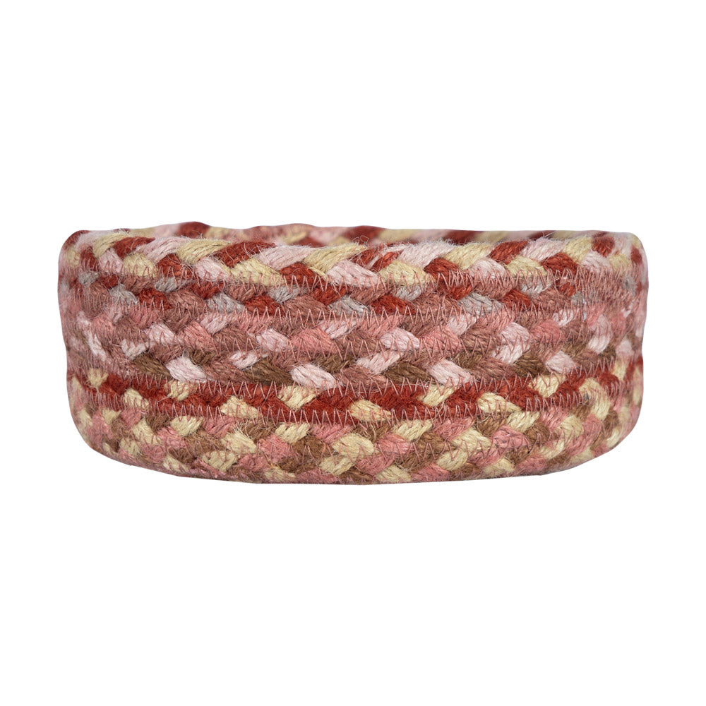 Small coral and natural woven basket from The Braided Rug Company.
