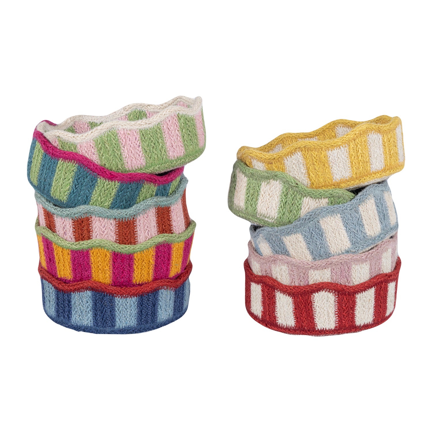 Two stacks of colorful, striped, knitted fabric bowls. Each bowl has a scalloped edge.