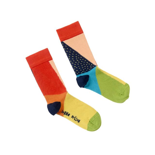 A pair of colorful socks with geometric color-blocked panels in red, orange, yellow, green, blue, and beige, featuring a navy patterned section on one leg and the brand name 'BONIA NELSON' printed on the yellow foot.