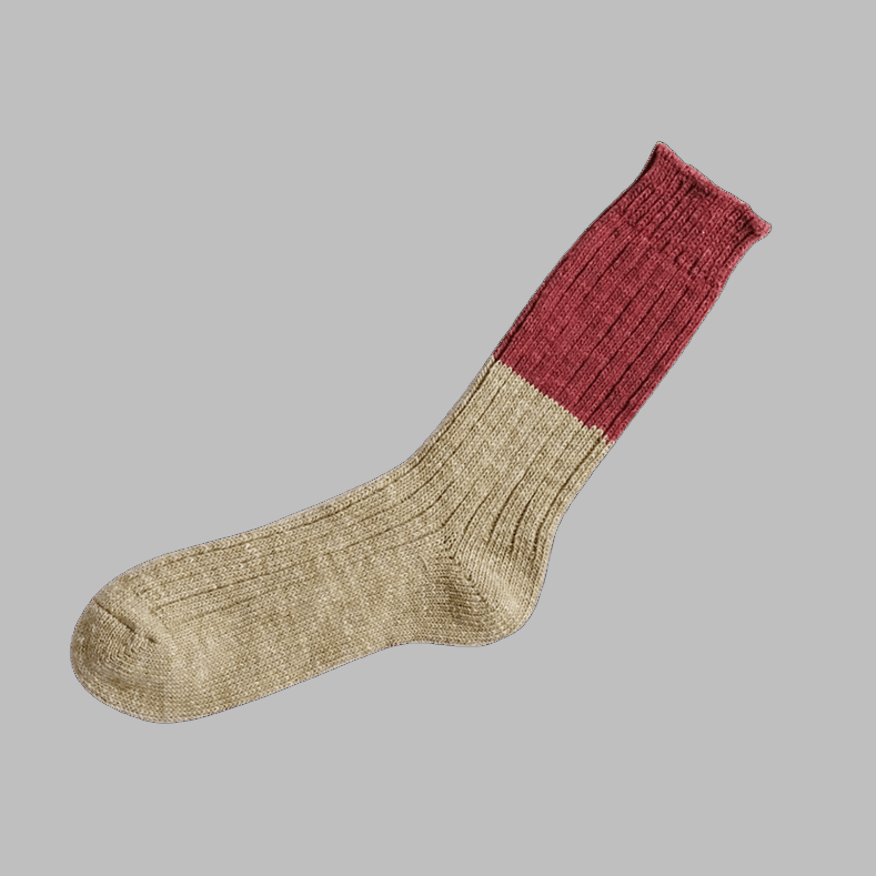 Beige and burgundy two-tone knitted wool sock.