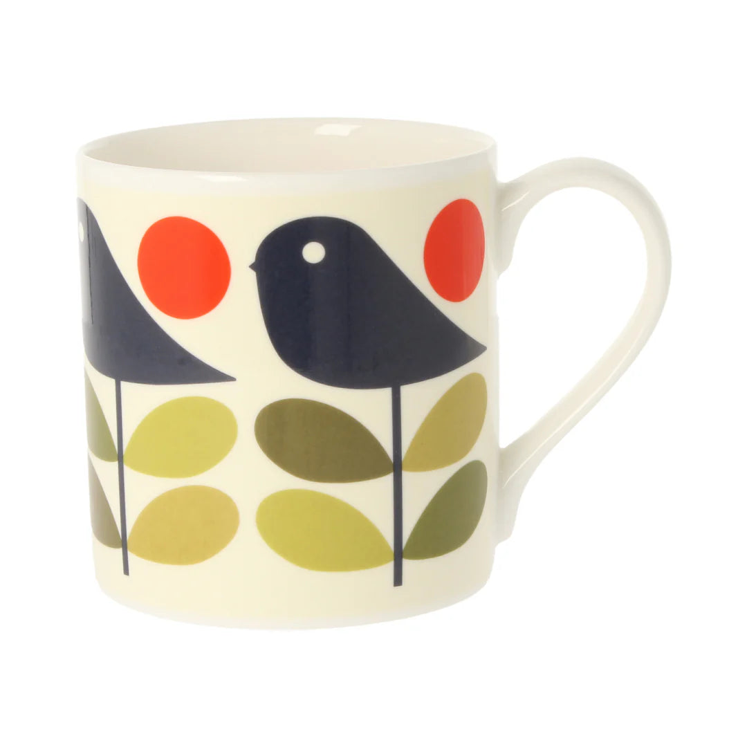 Mug with a bird and leaf design on a white background
