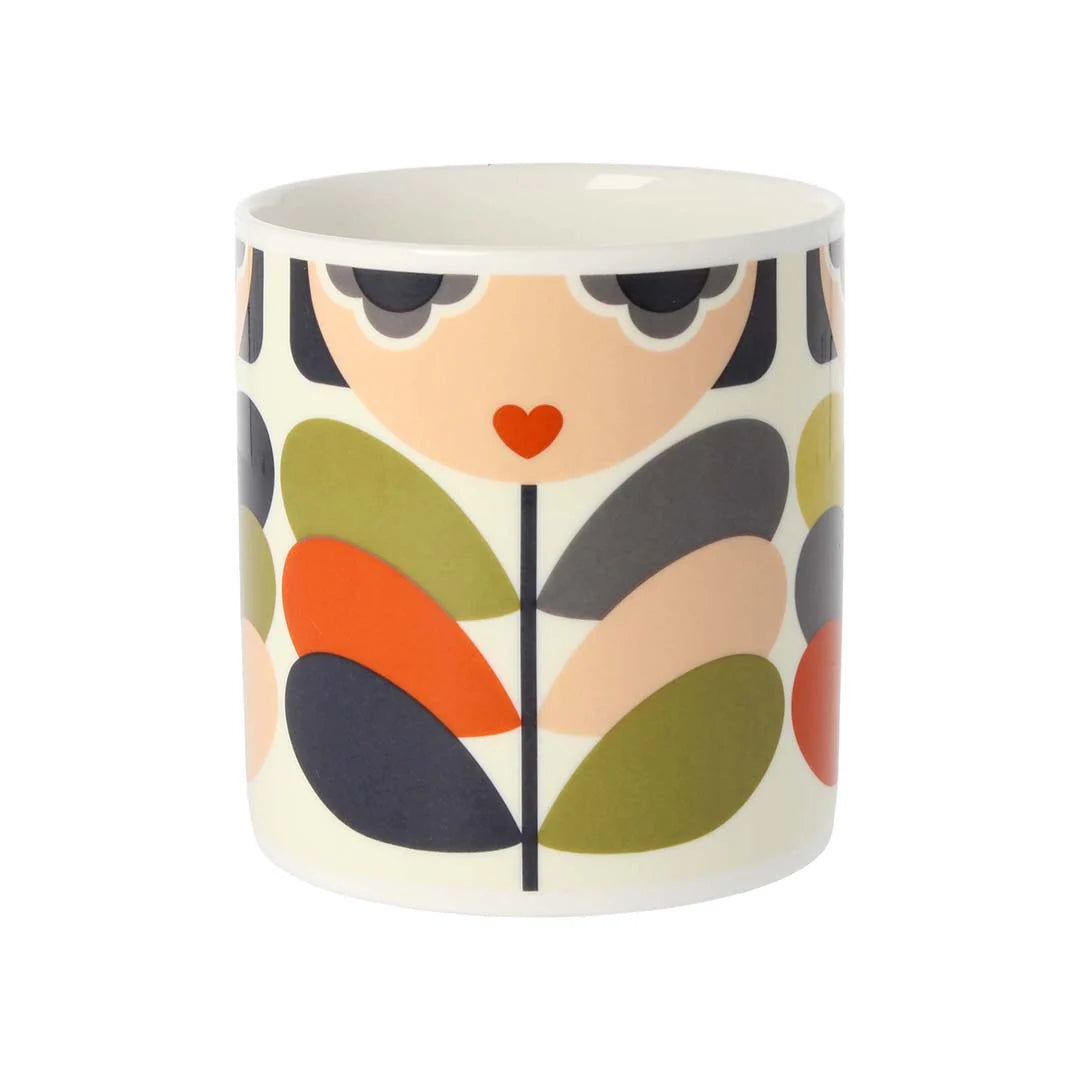 Ceramic mug with colorful abstract design on a white background