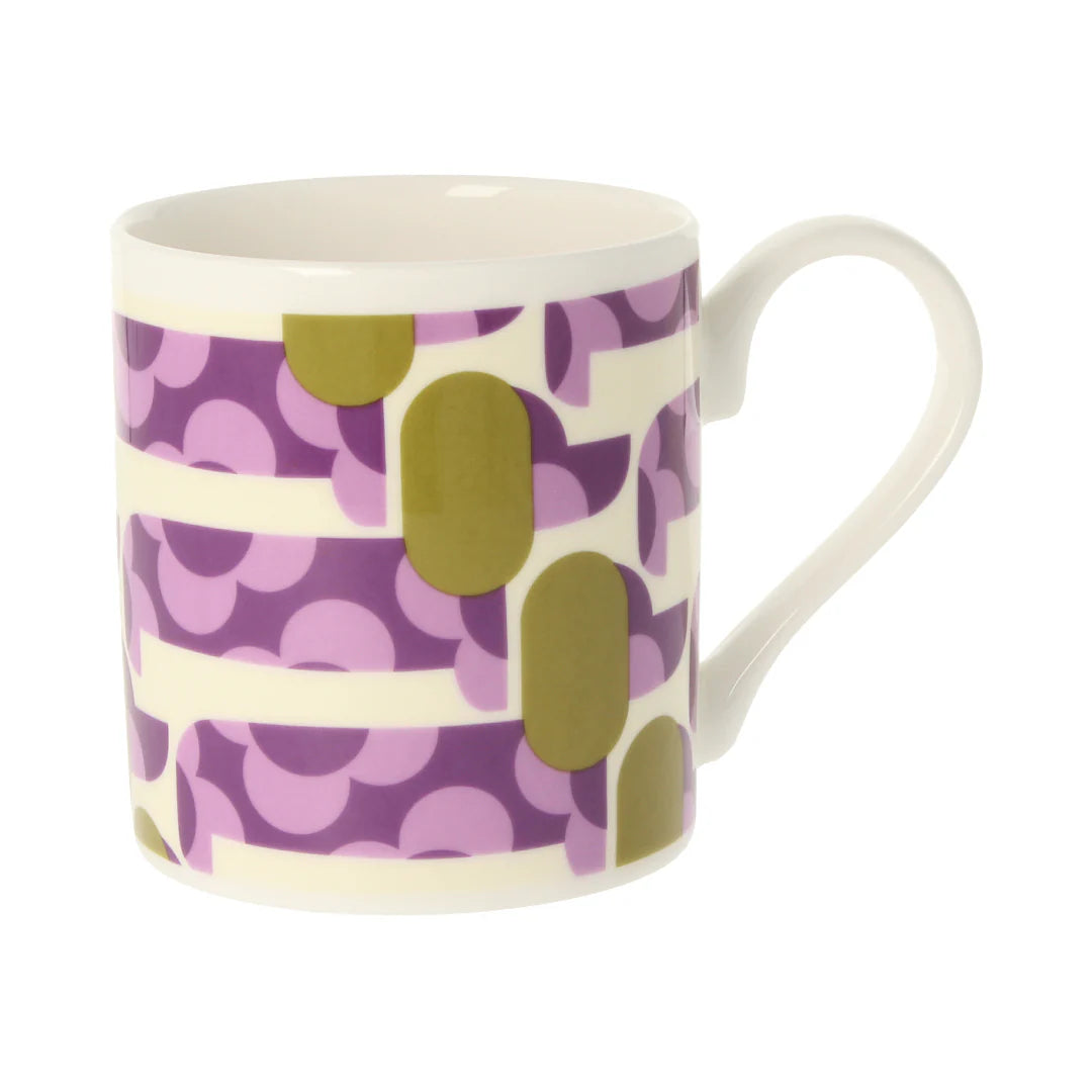 Mug with purple and green pattern on a white background