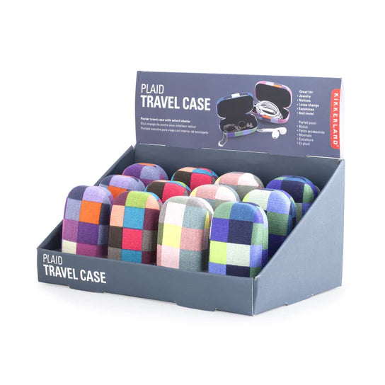 Plaid travel cases with velvet interiors; multiple colorful cases displayed on a retail stand.