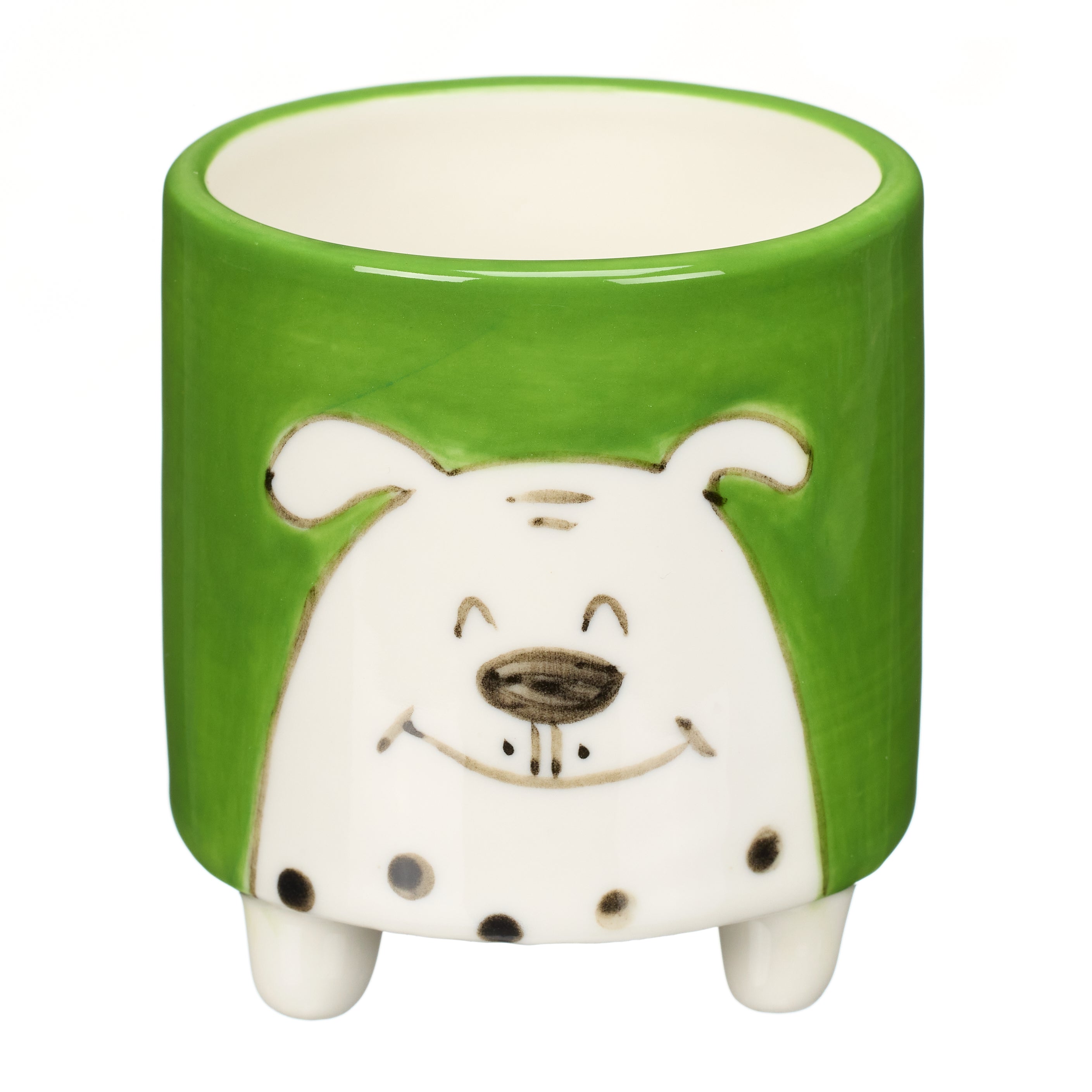 Green ceramic planter with a white dog face design and small white feet.