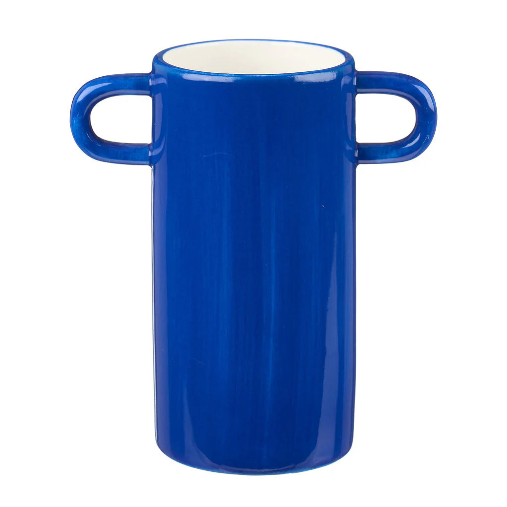 Cobalt blue cylindrical mug with two handles.