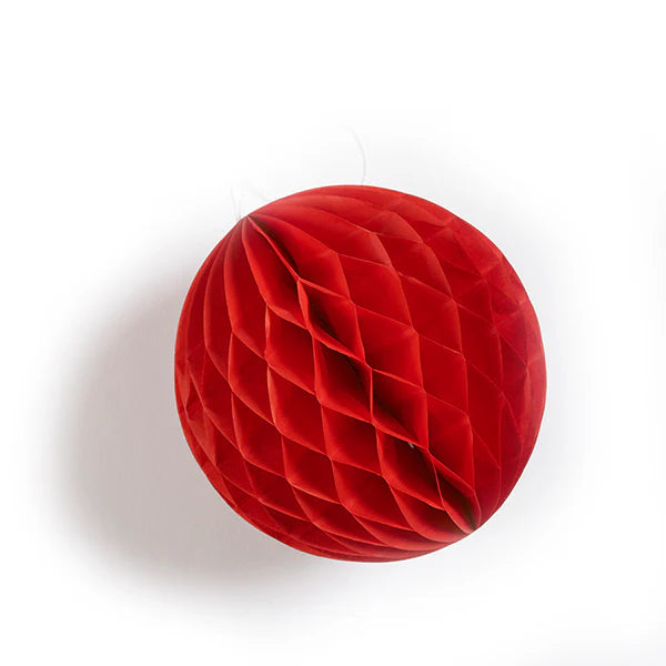 Red paper honeycomb ball decoration.