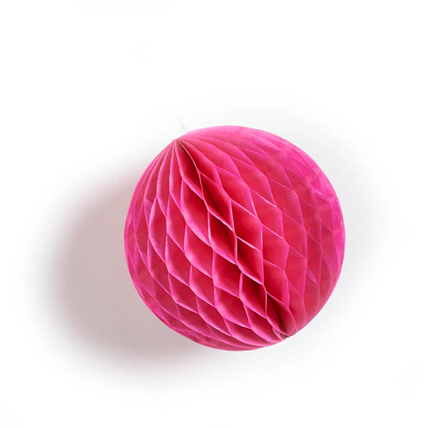 Pink honeycomb paper ball decoration.