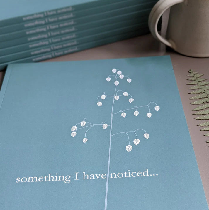 Teal journal featuring a minimalist white line drawing of a plant with the text "something I have noticed..."
