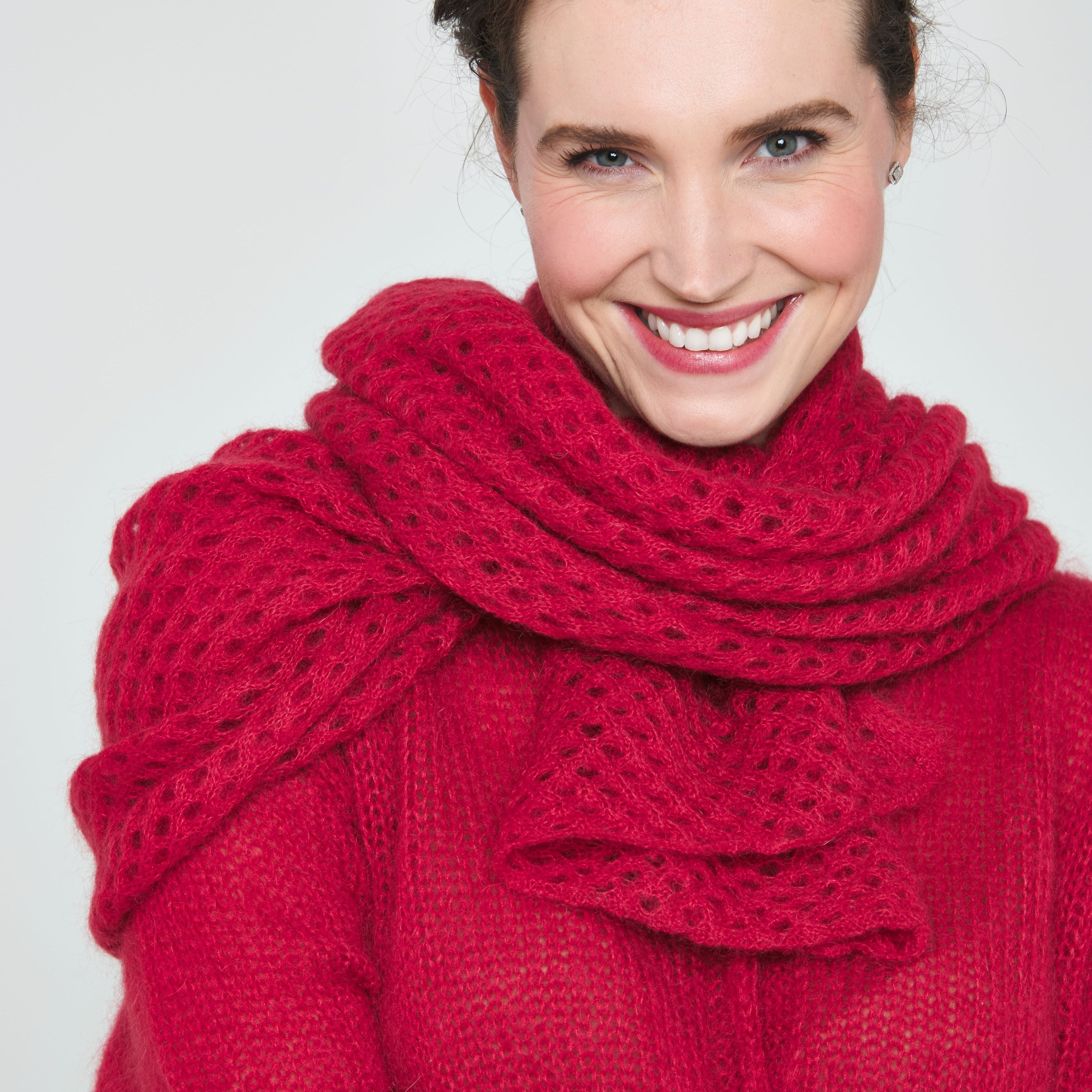 Red mohair knit sweater and matching open-weave scarf.  The soft, textured fabric has a lacy pattern.