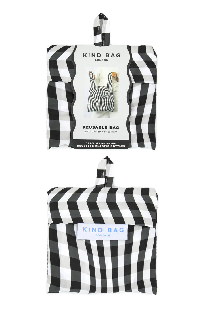 Black and white striped reusable Kind Bag, medium size, made from recycled plastic bottles.  Folded flat.