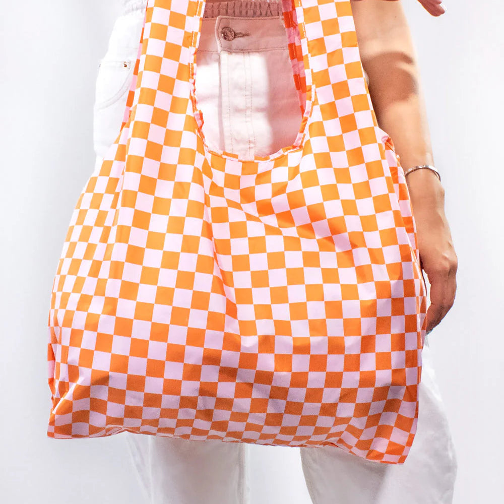 Orange and pink checkered reusable shopping bag.