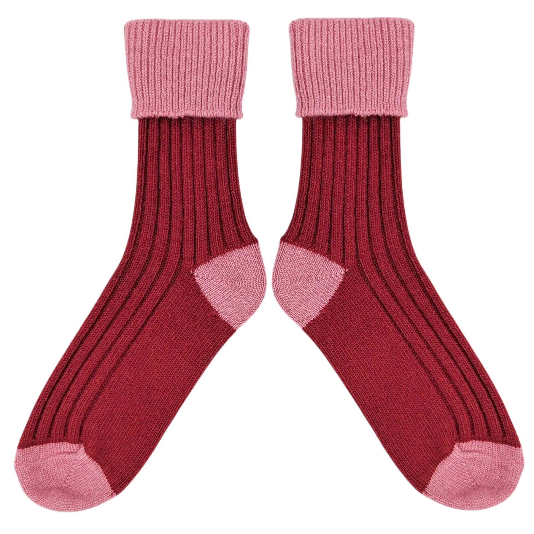 A pair of ribbed knit crew socks in shades of dusty rose pink and deep burgundy red, shown flat against a solid white background.