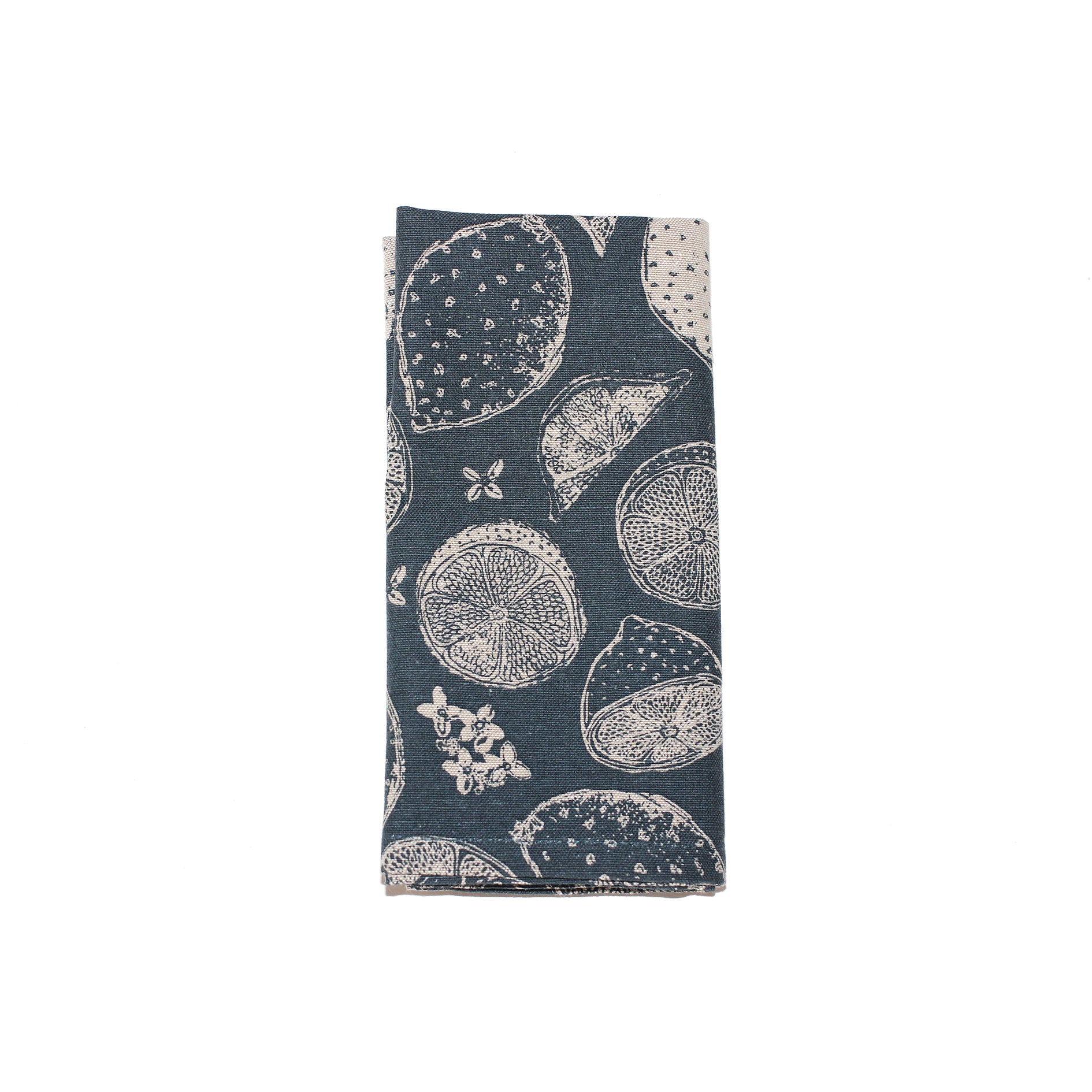 Dark teal tea towel with a pattern of off-white lemons and limes.