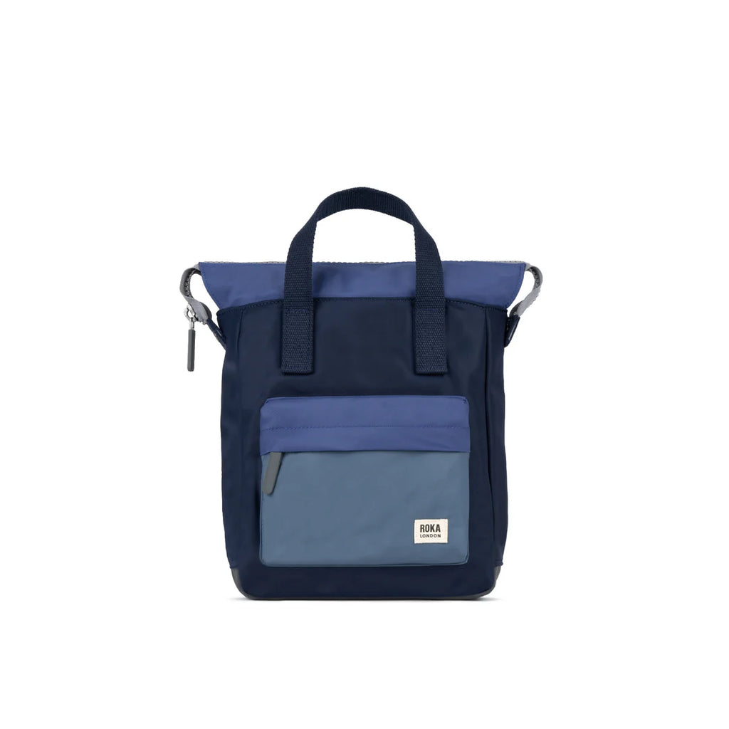 Navy blue backpack with a smaller blue section on a white background