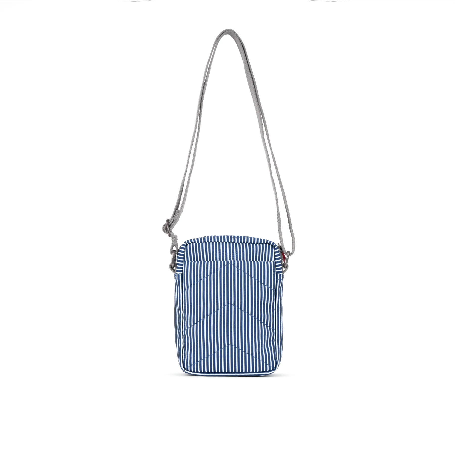 Blue and white striped crossbody bag on a white background
