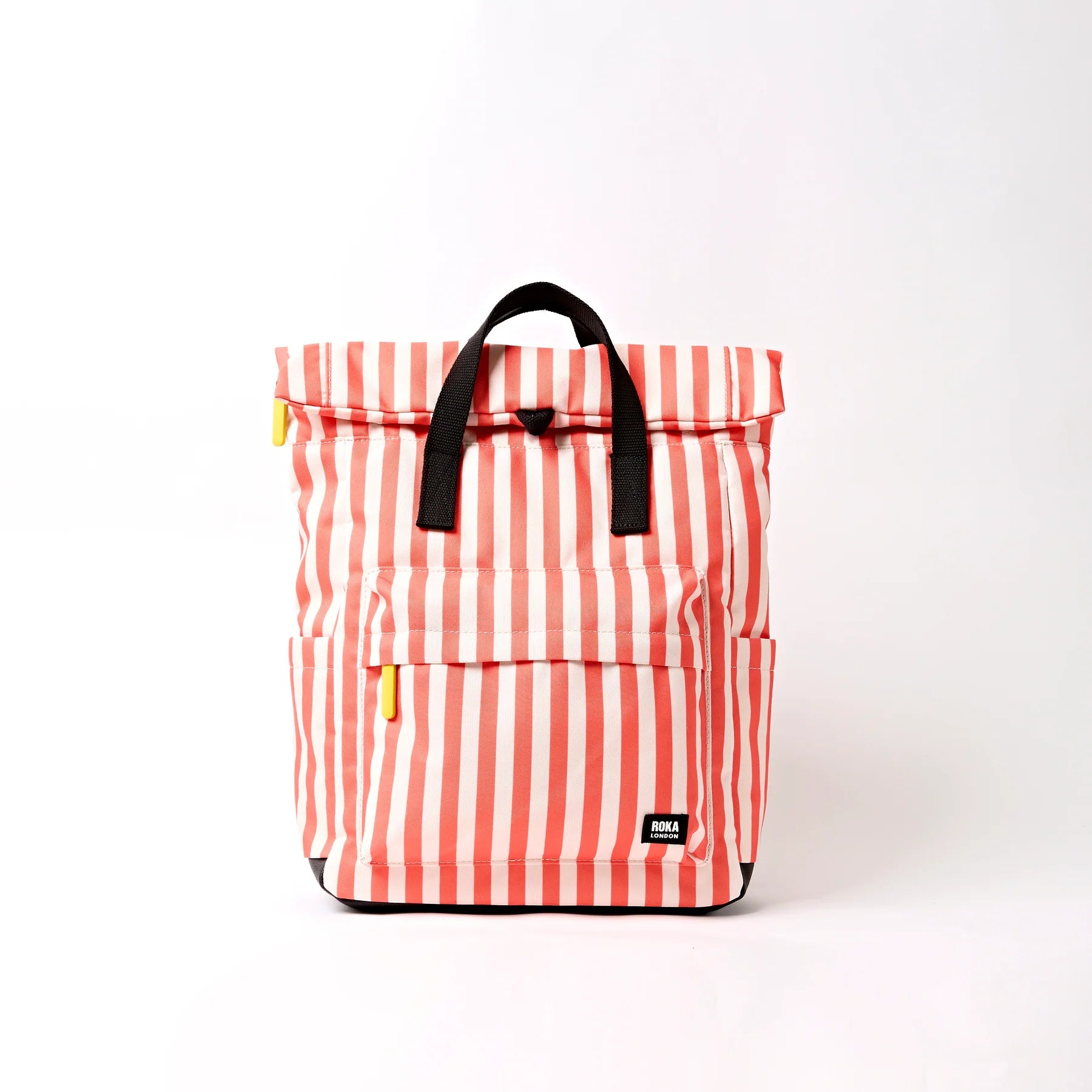 Red and white striped backpack with black straps on a white background